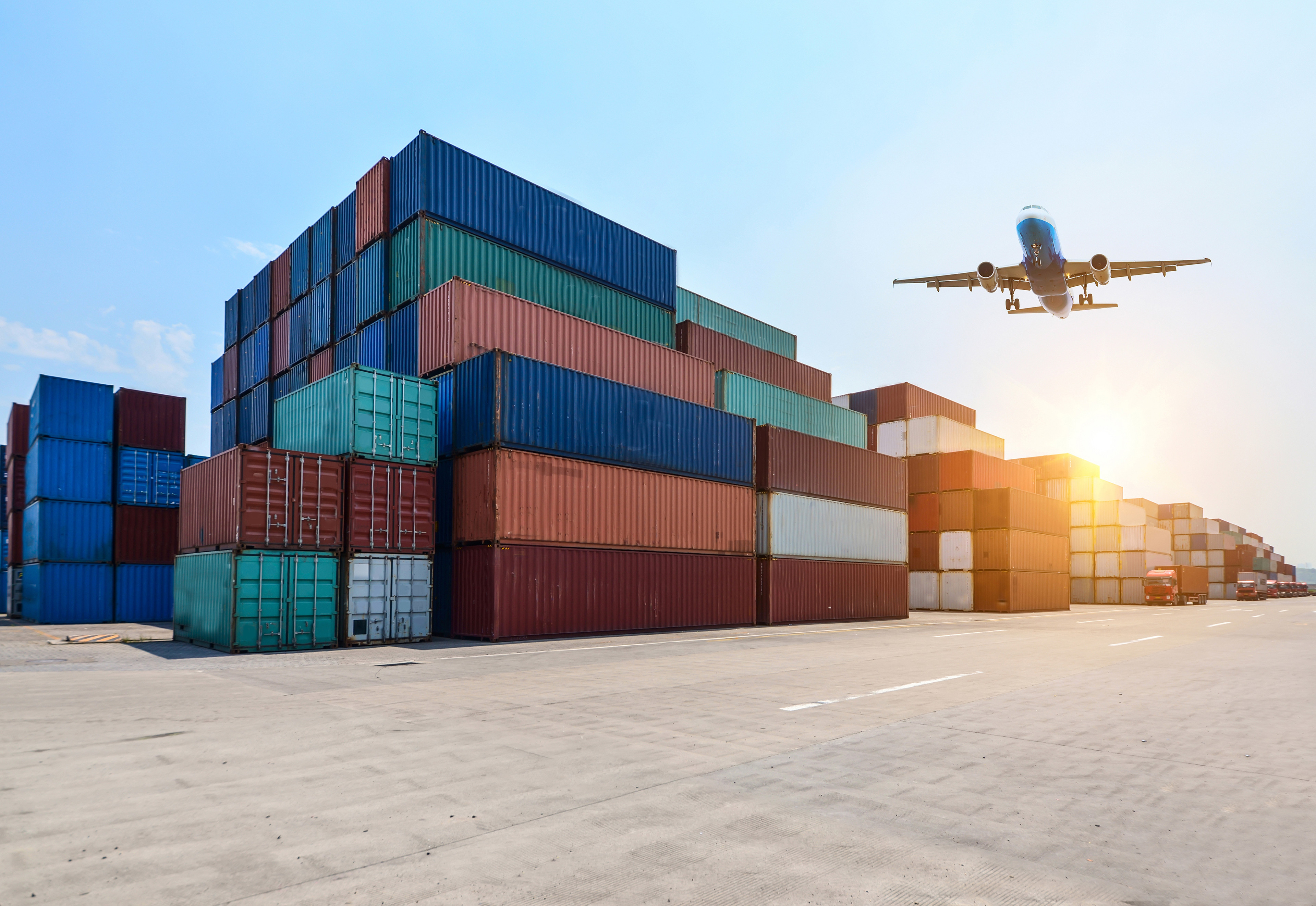 Port container yard with stacked shipping containers